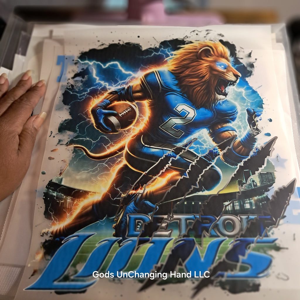 Close-up of football-playing Detroit lion design with lightning and claw marks